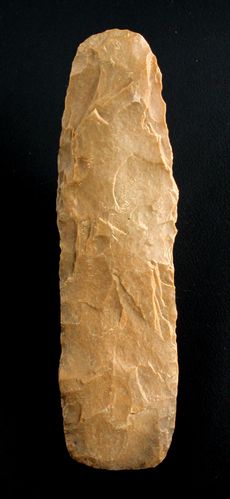 Neolithic hand axe, made from brown jasper